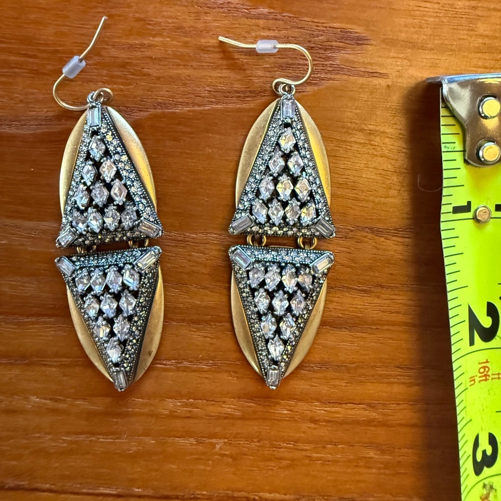 Gold earrings with crystal stones. Great to dress up any outfit